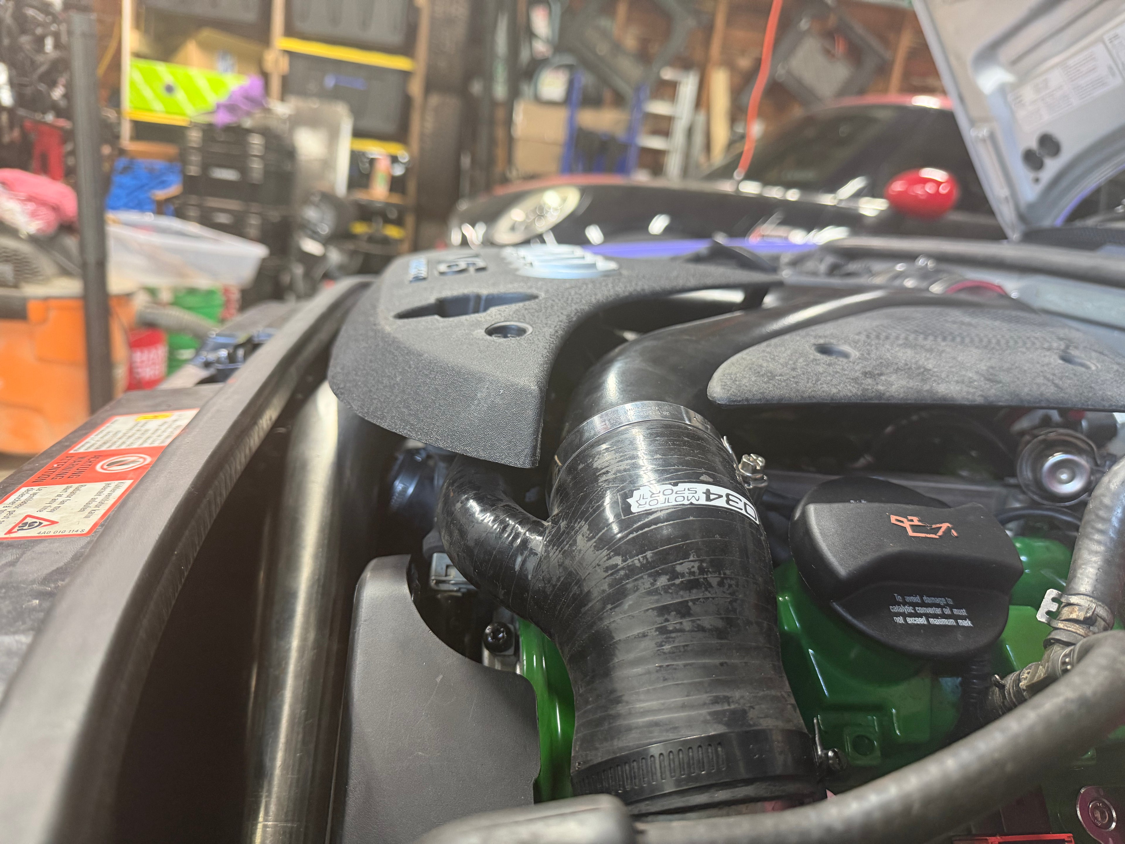 Engine cover riser kit
